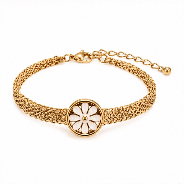 Gold-tone daisy mesh bracelet on a plain white background