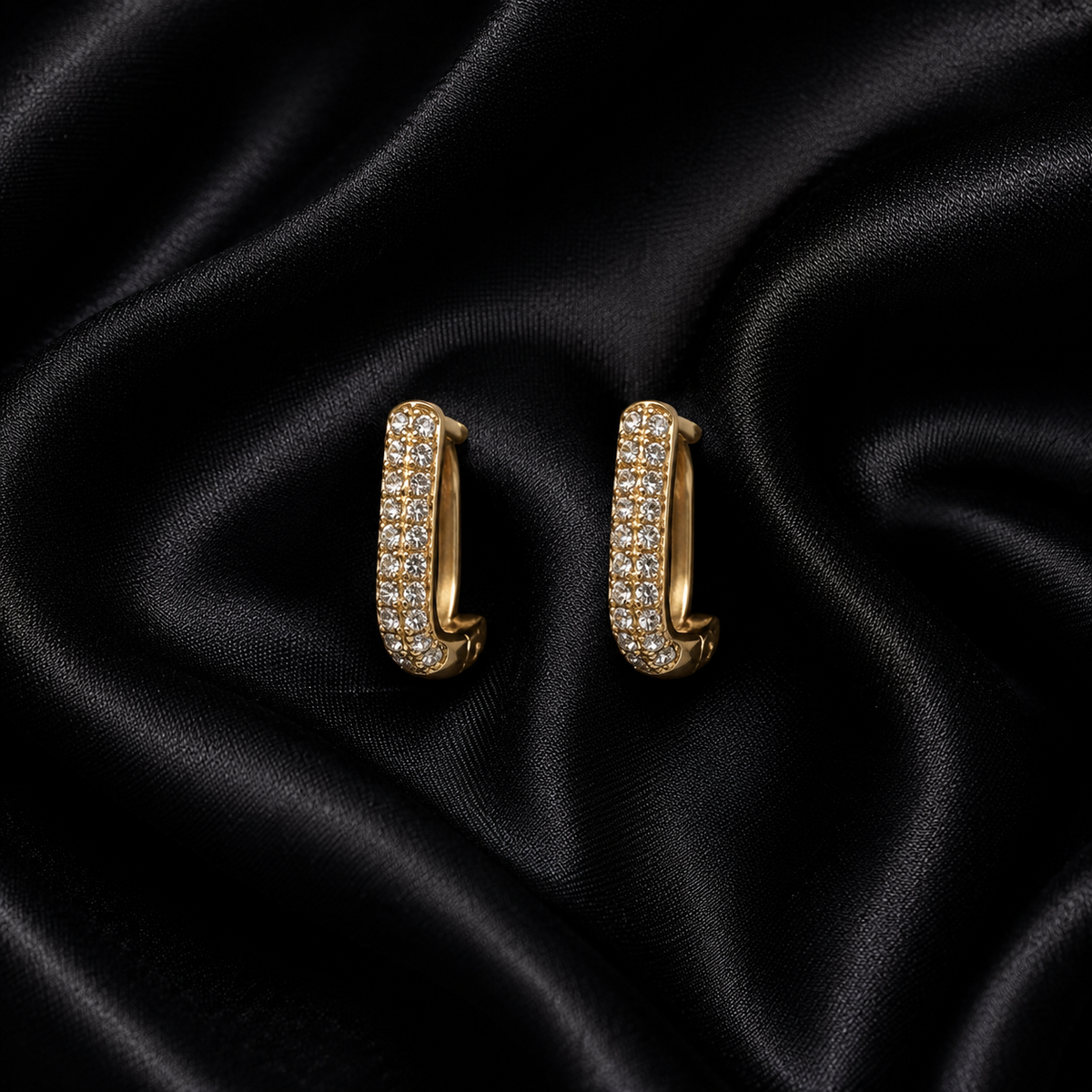 PRISA Crystal Pavé J-Hoop Earrings held in hand