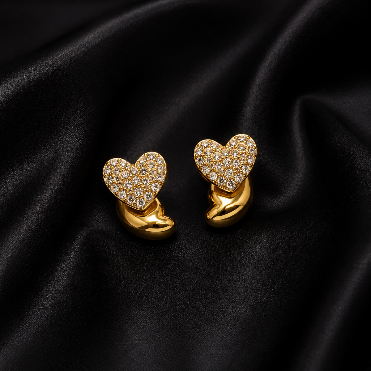 PRISA Gold Heart Crystal Stud Earrings on black satin