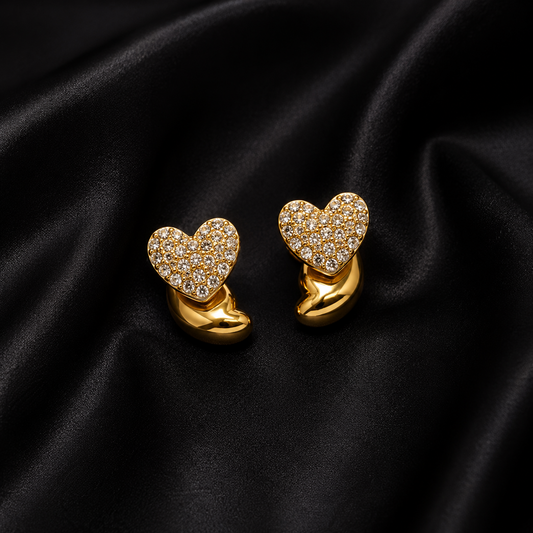 PRISA Gold Heart Crystal Stud Earrings on black satin