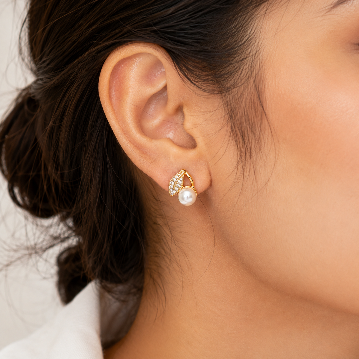 PRISA Pearl Leaf Drop Earrings worn by a woman