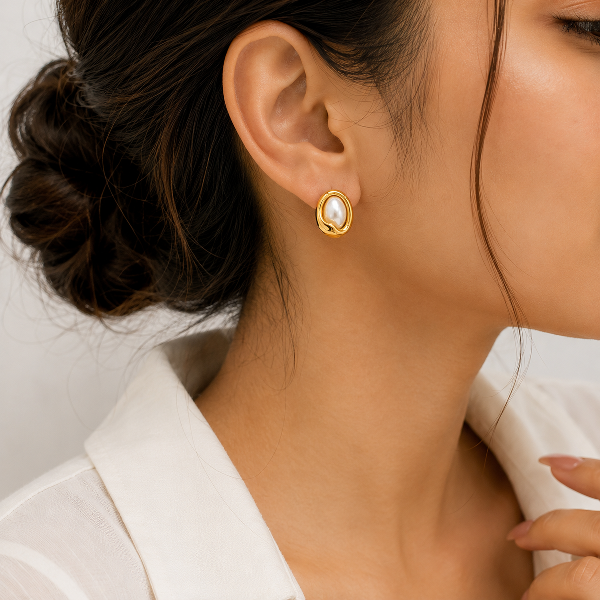 PRISA Gold Pearl Statement Stud Earrings worn by a woman
