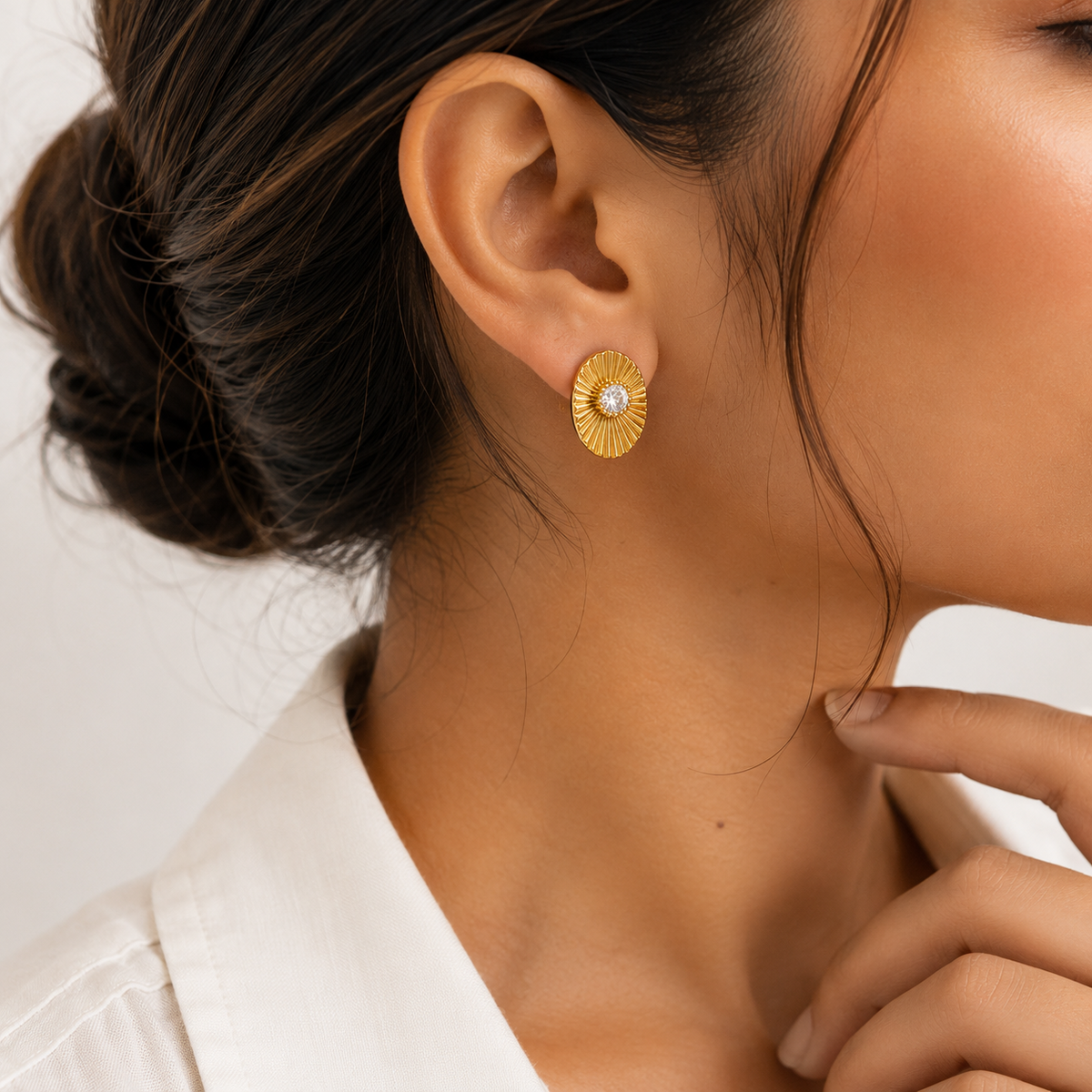 PRISA Radiant Sunburst Stud Earrings worn by a woman