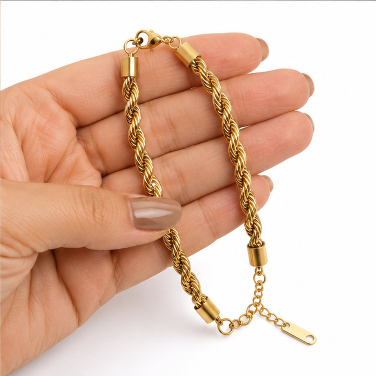 PRISA gold rope twist anti-tarnish stainless steel bracelet held in hand