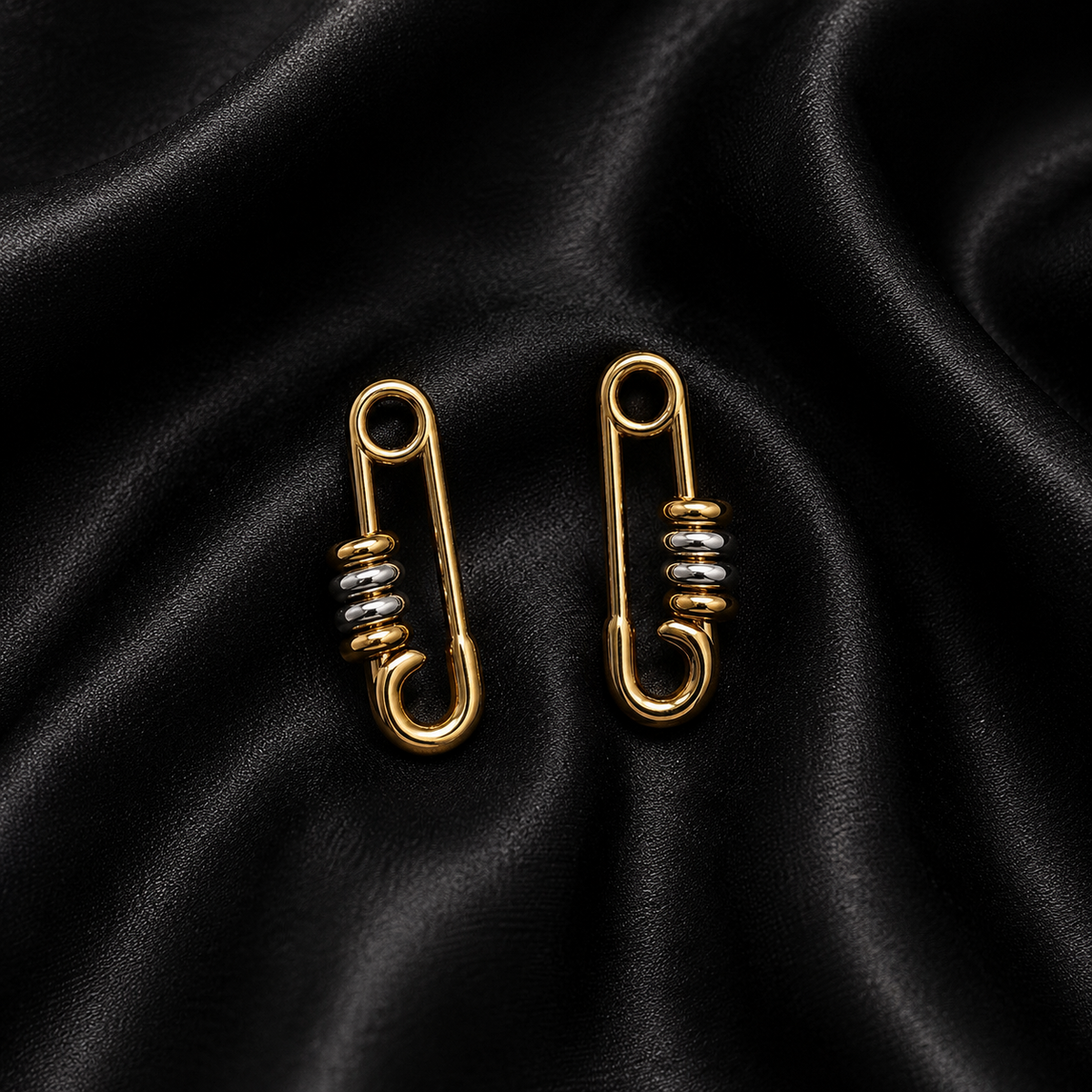 PRISA Gold Safety Pin Statement Earrings on black satin