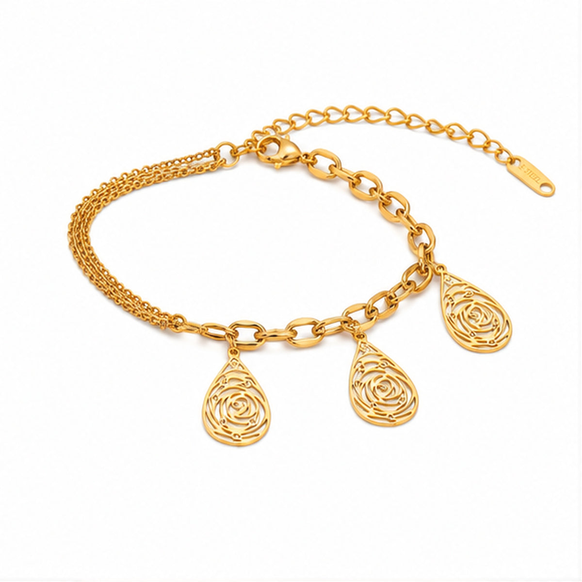 Gold teardrop filigree charm bracelet on plain white background